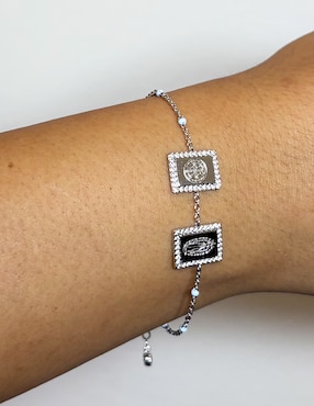 Pulsera Carmela Mía14 k Religiosos con acabado baño de oro blanco
