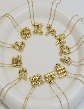 Collar con dije de signo zodiacal Nira de oro laminado 10 K