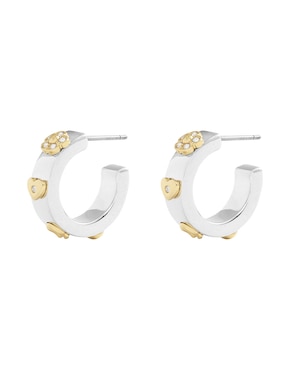 Aretes huggies Coach con acabado brillante