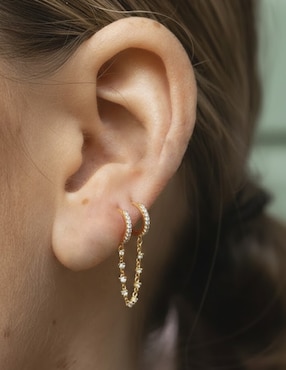 Piercing circular Carmela Mía 14 K con acabado baño de oro zirconia