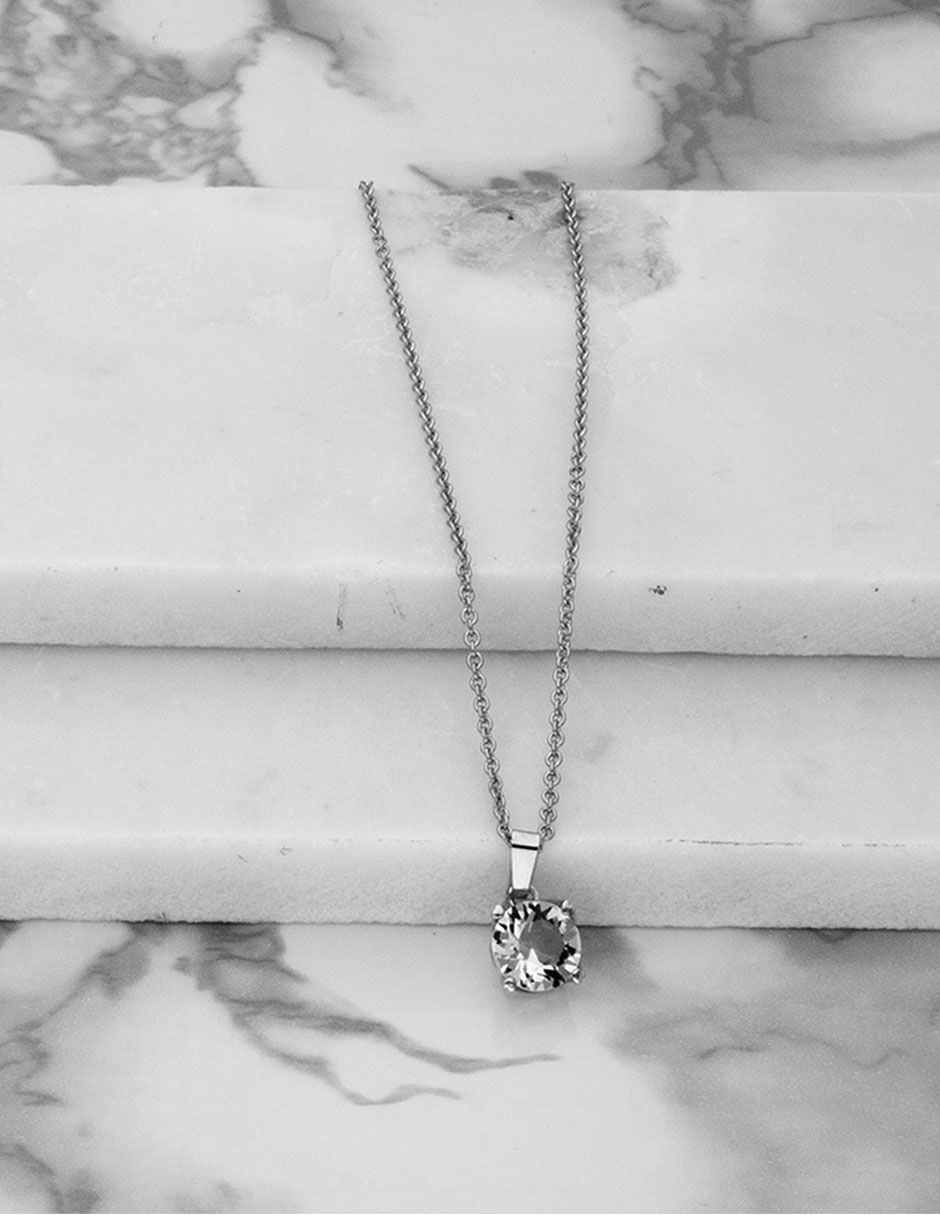 Dije redonda cristal 4