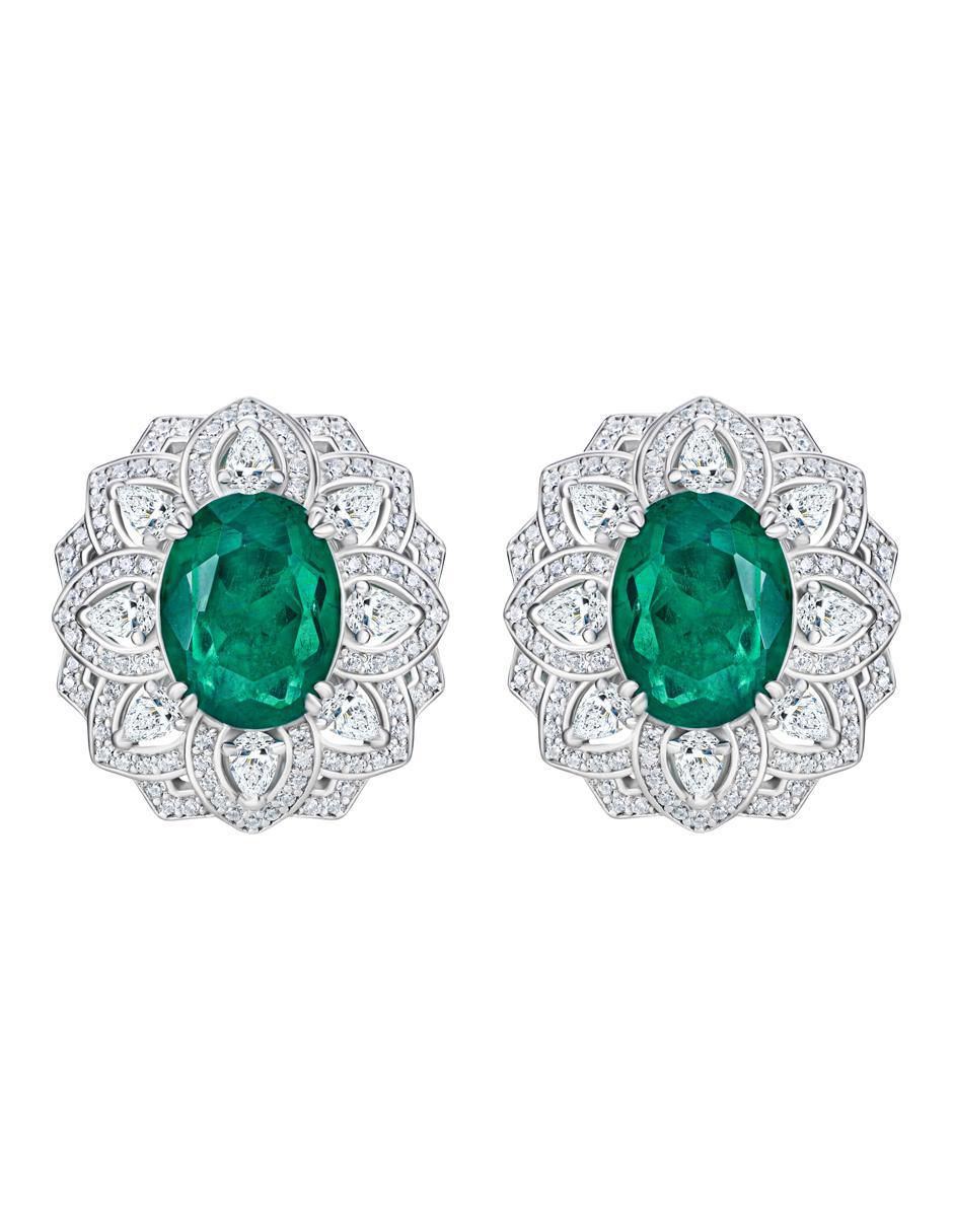 Broqueles de flor de plata p 925 con acabado pavé esmeralda Broqueles de flor de plata p 925 con acabado pavé esmeralda