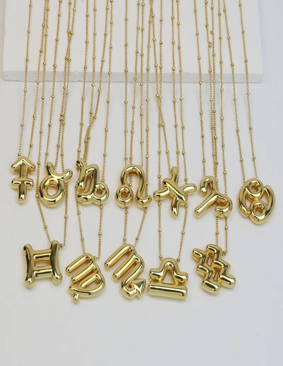 Collar con dije de signo zodiacal de oro laminado 3