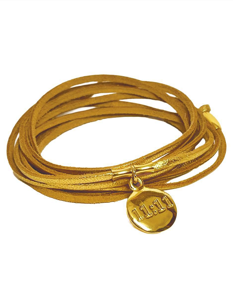 Pulsera de piel con acabado baño de oro 18 k