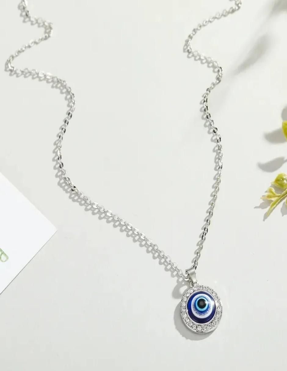 Collar y pulsera de ojo circonita 4